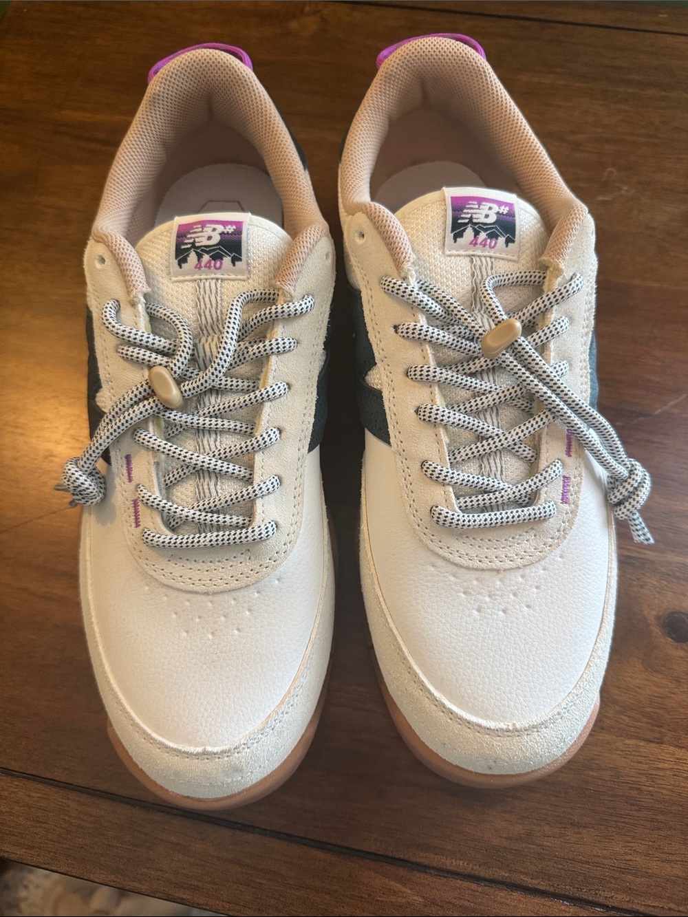 New Balance Cream Sneakers with Black and Purple Accents